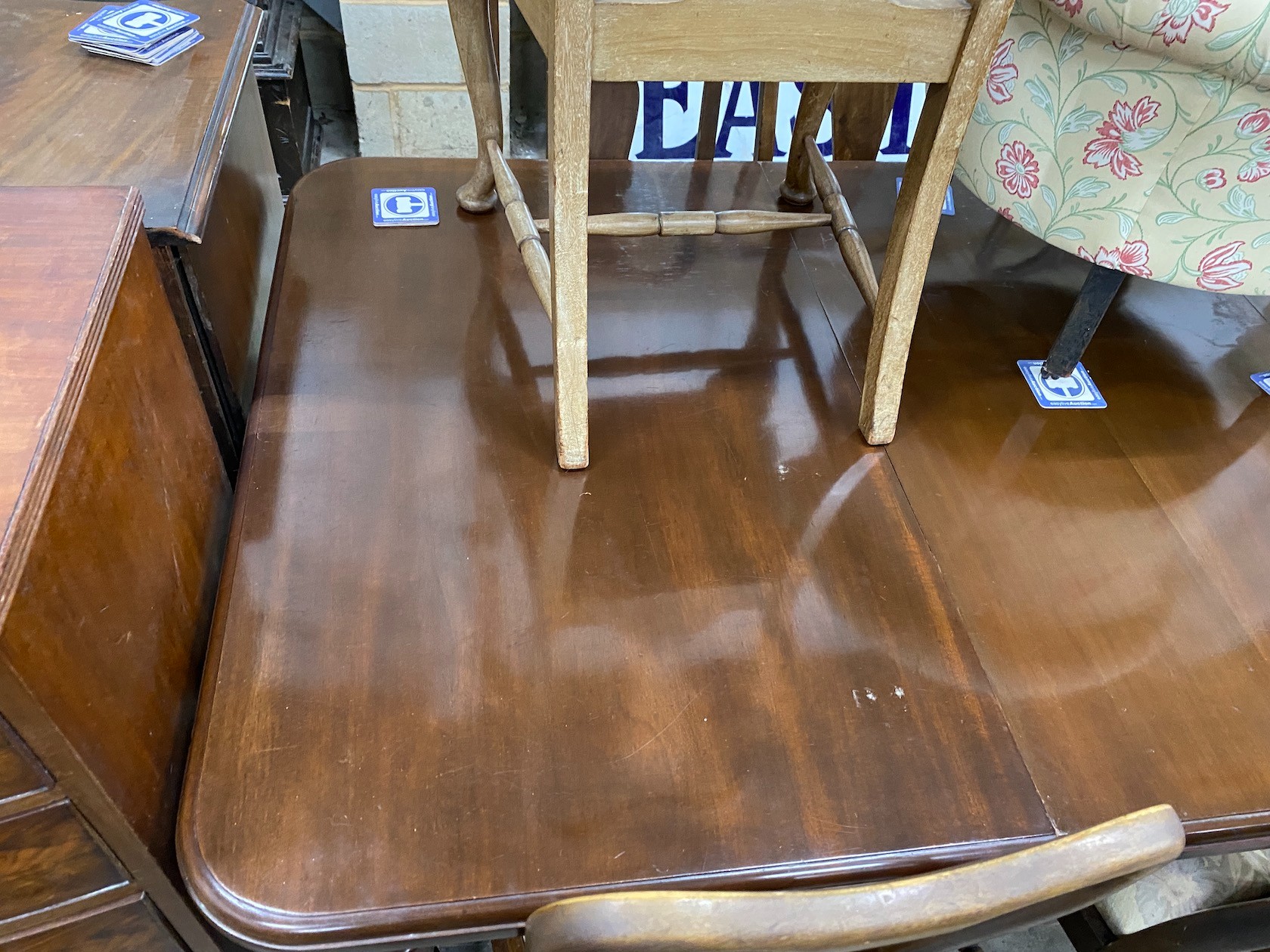A Victorian mahogany extending dining table on turned legs, length 302cm extended (two spare leaves), depth 120cm, height 73cm
